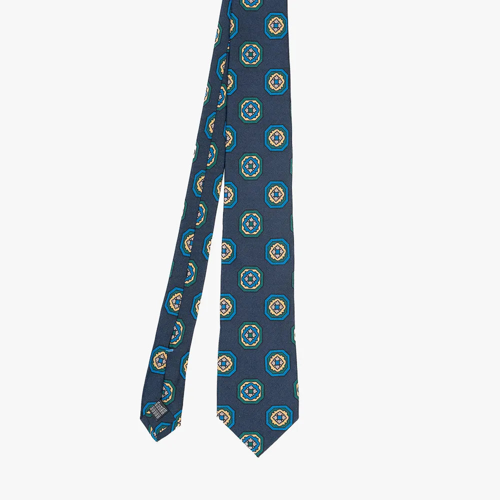 Full view of the Stefano Cau floral tie in dark navy showing the refined floral pattern and elegant proportions.

