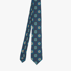 Full view of the Stefano Cau floral tie in dark navy showing the refined floral pattern and elegant proportions.
