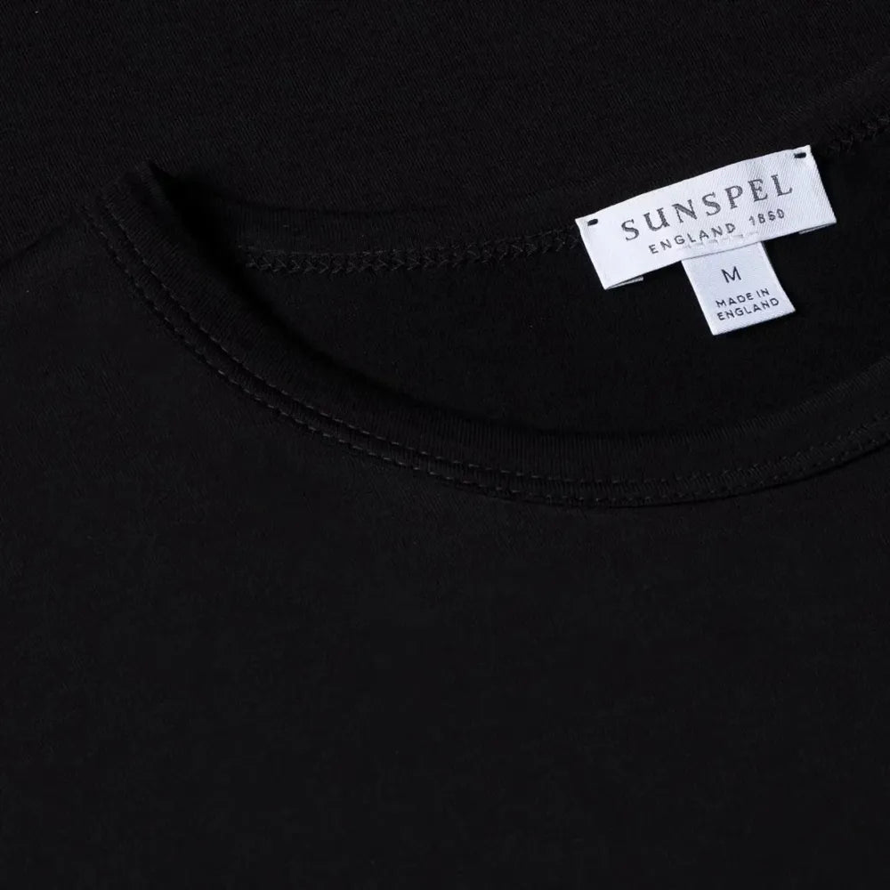 Close-up of the collar of the Sunspel Classic T-shirt Black showing the fine cotton jersey and refined neckline.
