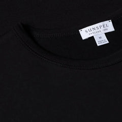 Close-up of the collar of the Sunspel Classic T-shirt Black showing the fine cotton jersey and refined neckline.
