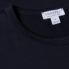 Close-up of the collar of the Sunspel Classic T-shirt Navy showing the fine cotton jersey and refined neckline.
