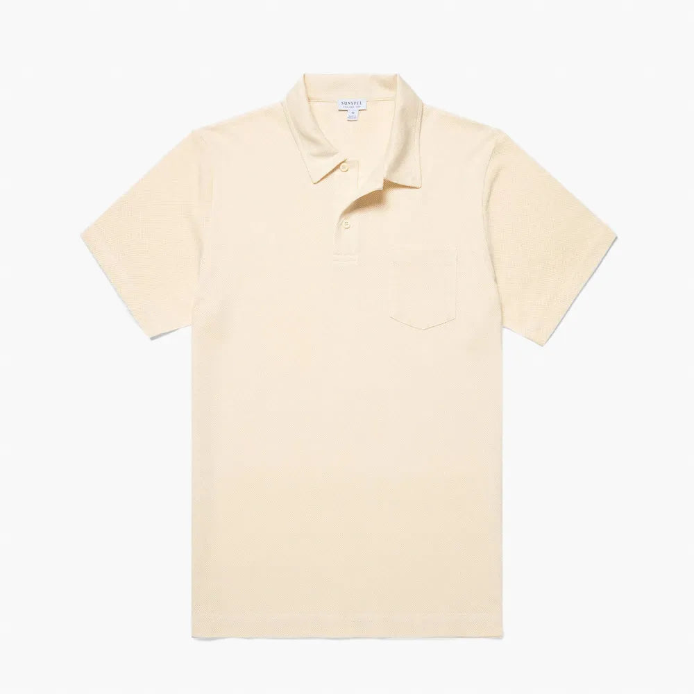 Front view of the Sunspel Riviera Polo Shirt Buttermilk highlighting the clean tailored silhouette and soft buttermilk tone.