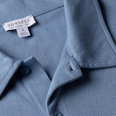 Close-up of the collar of the Sunspel Riviera Polo Shirt Cornflower showing the breathable mesh cotton and refined neckline.