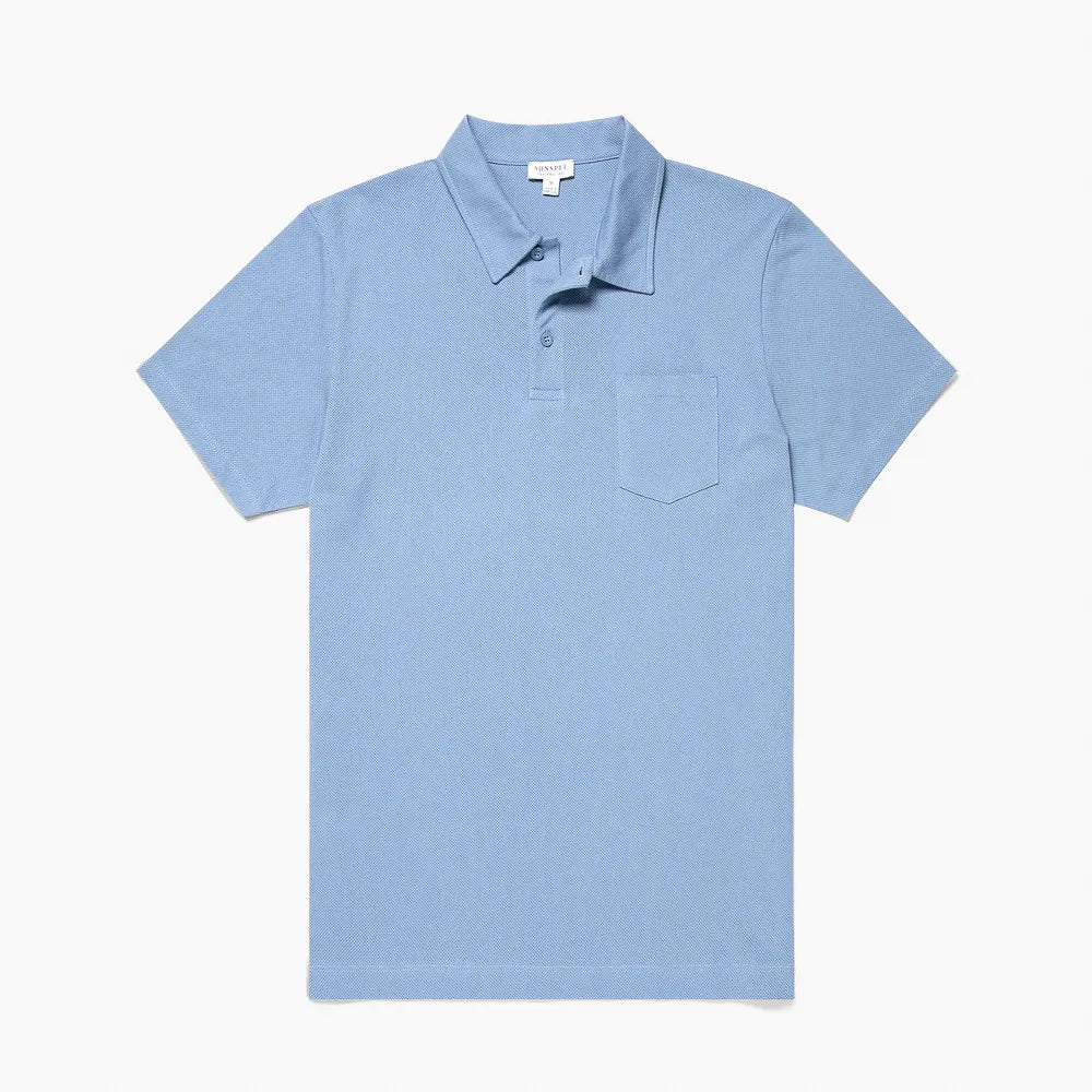 Front view of the Sunspel Riviera Polo Shirt Cornflower highlighting the clean silhouette and vibrant cornflower-blue tone.