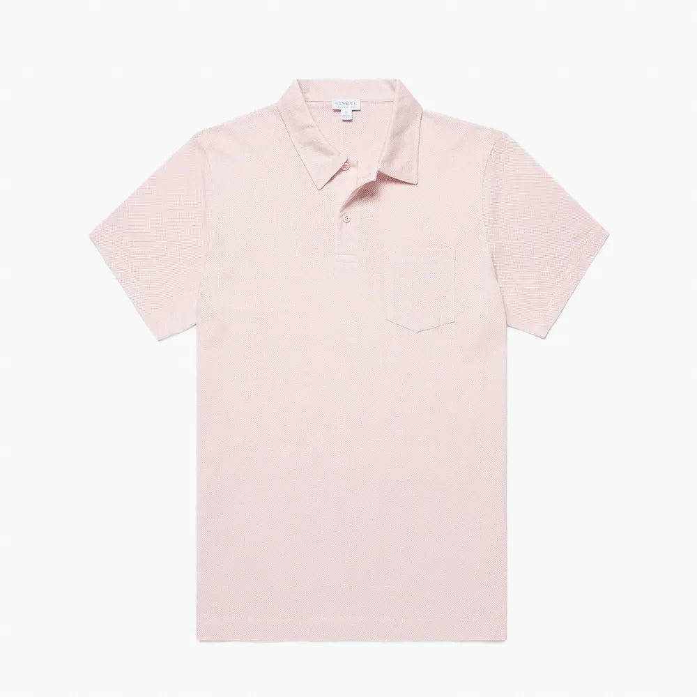 Front view of the Sunspel Riviera Polo Shirt Pastel Pink highlighting the clean silhouette and light pastel tone.
