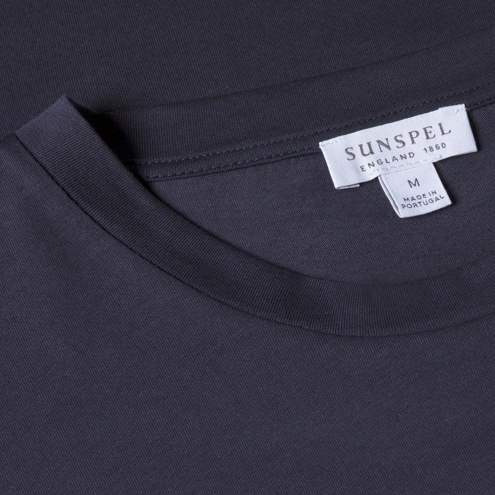 Close-up of the collar of the Sunspel Riviera T-shirt Navy showing the breathable mesh cotton and refined neckline.