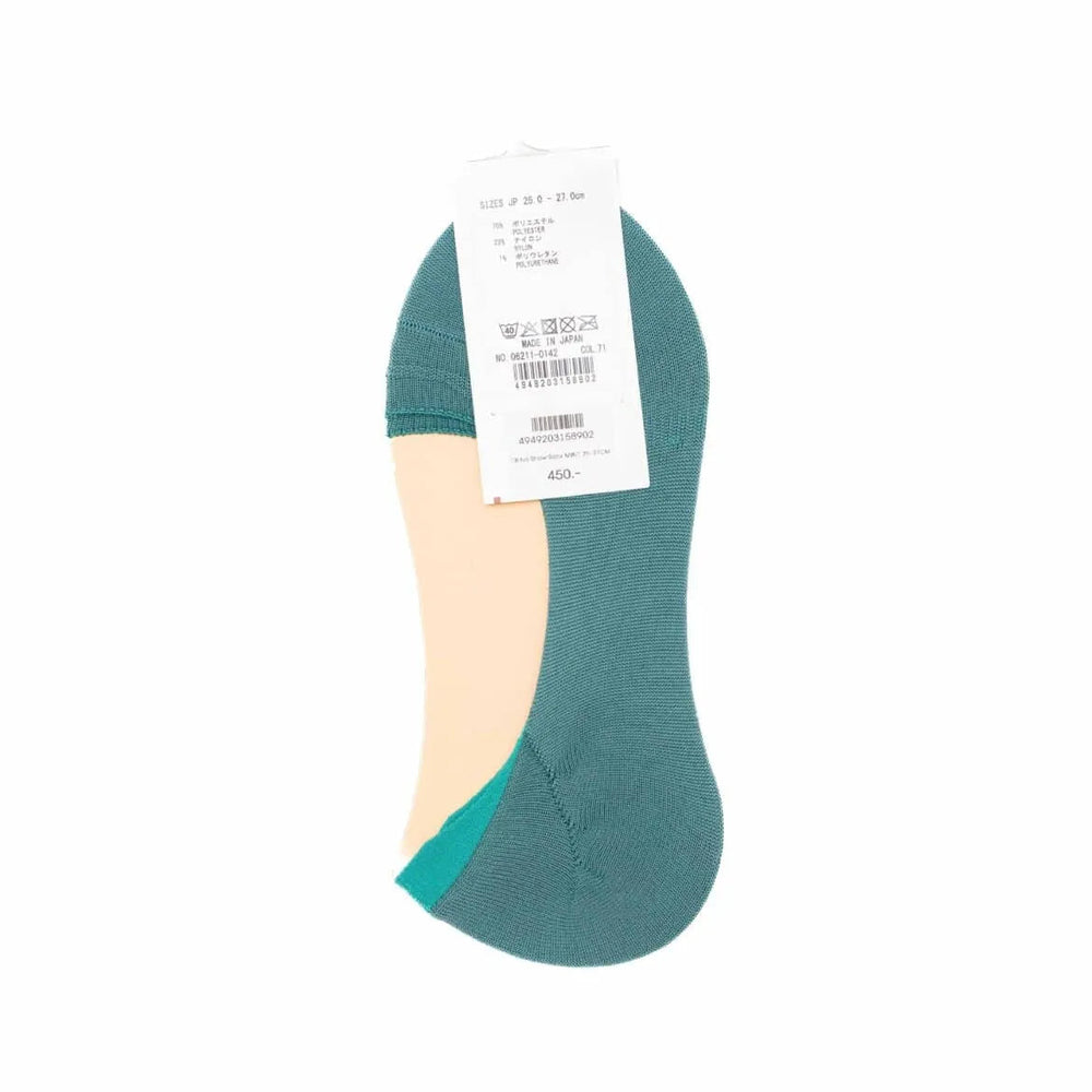 Side view of Tabio No Show Socks in mint, showing profile and low-cut fit