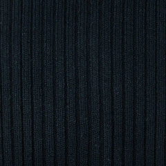 Close-up of the black ribbed knit texture on Tabio Power Rib Long Calf Socks
