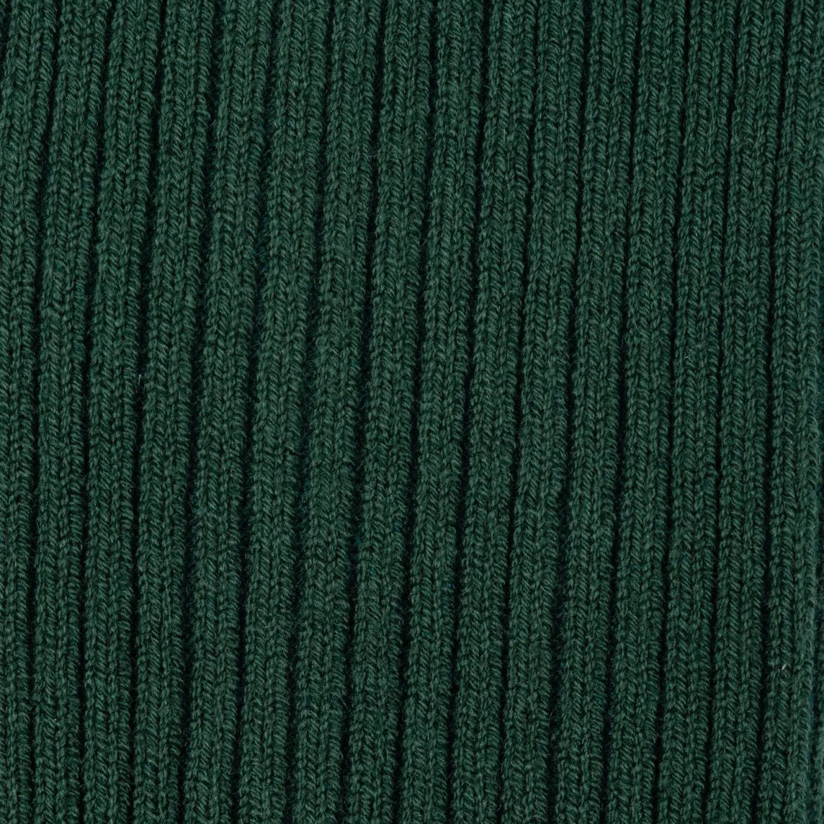 Close-up of the green ribbed knit texture on Tabio Power Rib Mid Calf Socks