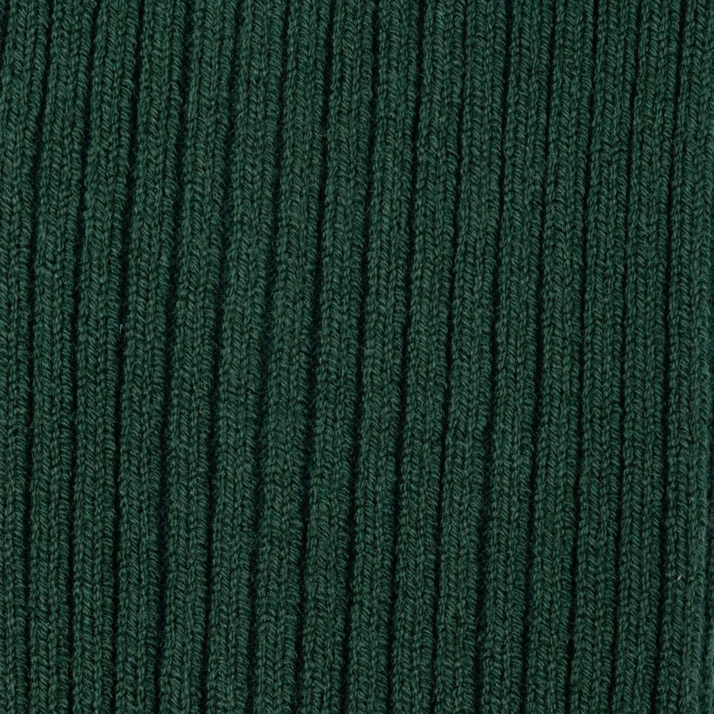 Close-up of the green ribbed knit texture on Tabio Power Rib Mid Calf Socks