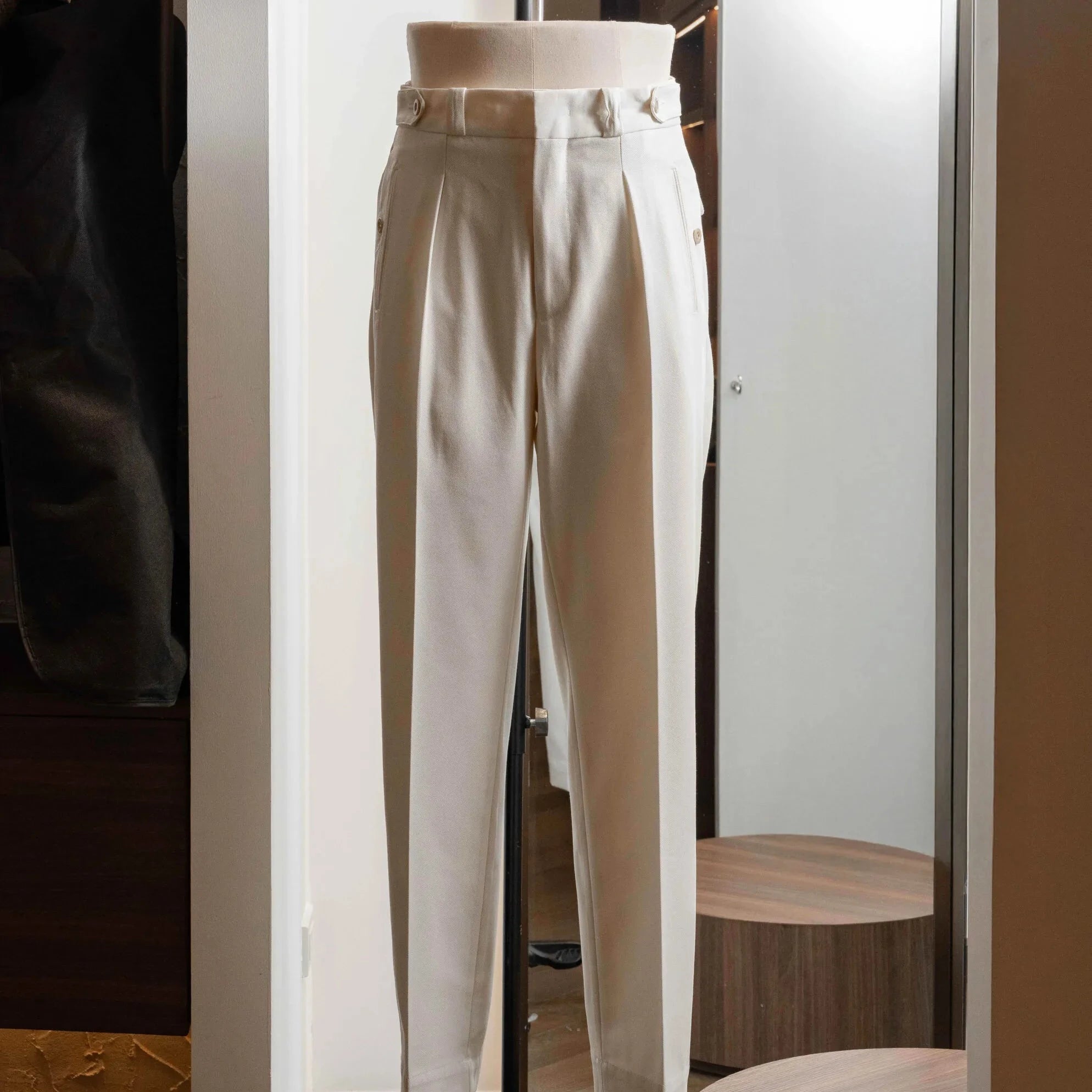 Full-length view of the Tangent Tan 04° Charles Hard Twist Twill Off White trousers, showing the clean tapered silhouette.