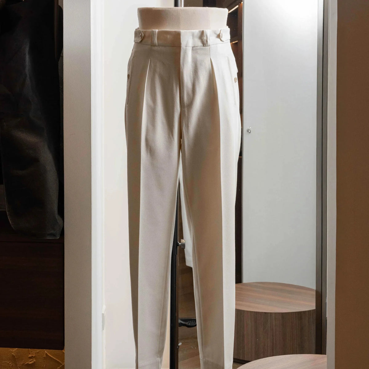 Full-length view of the Tangent Tan 04° Charles Hard Twist Twill Off White trousers, showing the clean tapered silhouette.