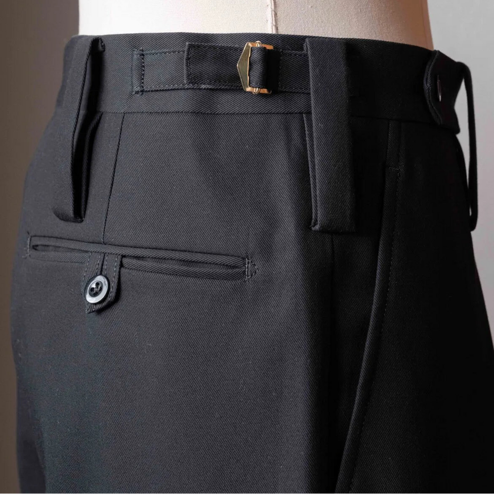 Rear view of the Tangent TAN25 Pat Black trousers featuring the back pockets and refined finishing.