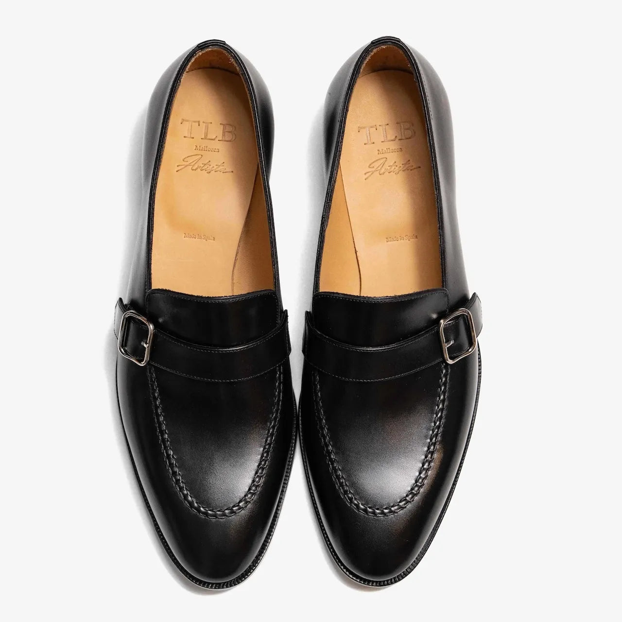 Top-down view showing the silver buckle detail and fine stitching on the TLB Mallorca 325 Goya Buckled Loafer.