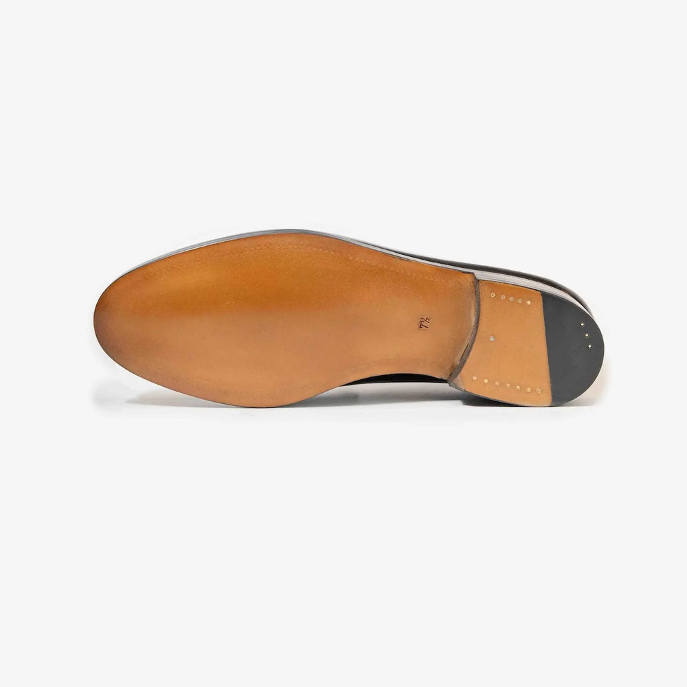 Underside view of the TLB Mallorca Goya Buckled Loafer showing the single leather sole and Goodyear welt craftsmanship.